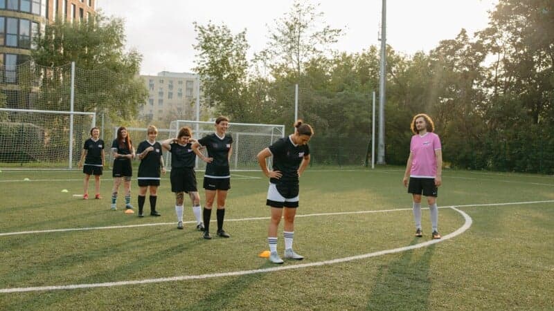 Spelare på en fotbollsplan Spelare på en fotbollsplan